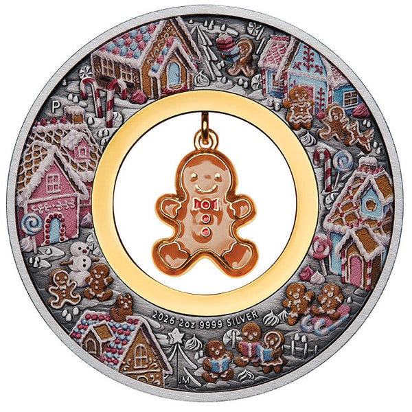2026 Gingerbread Christmas 2oz silver antiqued coloured coin reverse with dangling gold-plated gingerbread man in a gingerbread village scene